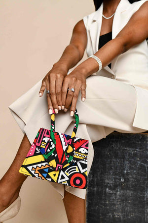 african print mini bags. floral mini bags. luxury mini bags. african bags. pink mini bags. african inspired handbags