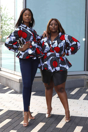 
            
                Load image into Gallery viewer, African blouses. African top. Wrap top for women. Exaggerated sleeves tops. Floral tops
            
        