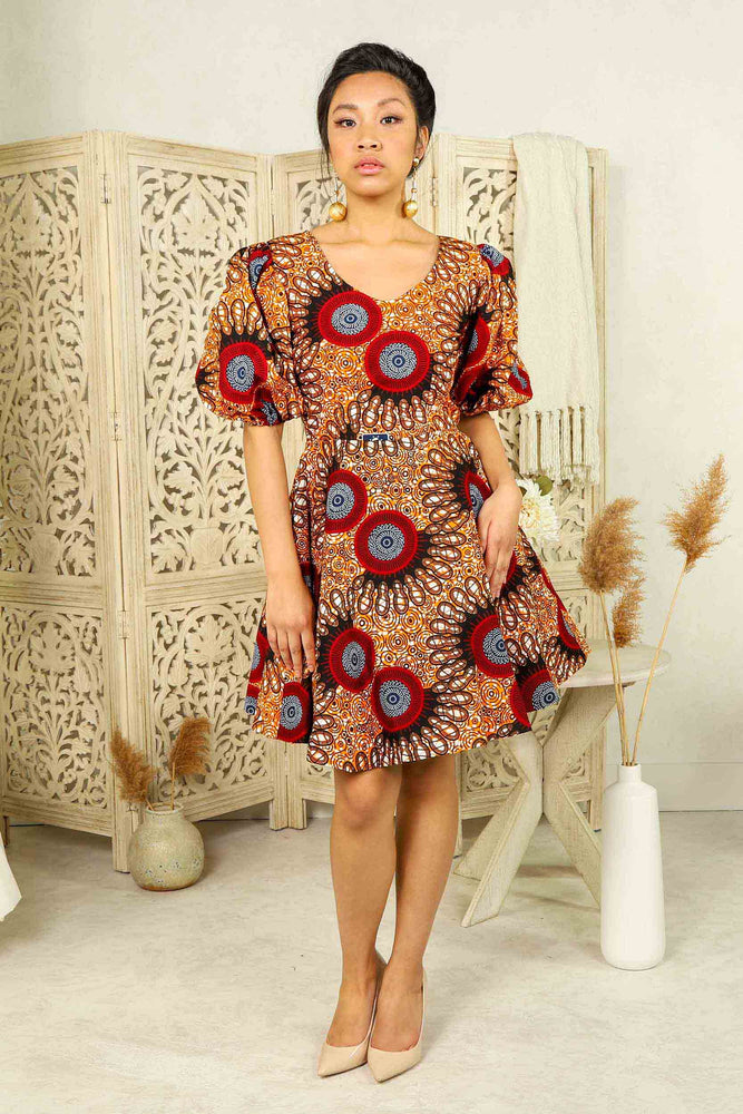 
            
                Load image into Gallery viewer, orange african short dress with puff sleeves and side pockets.
            
        