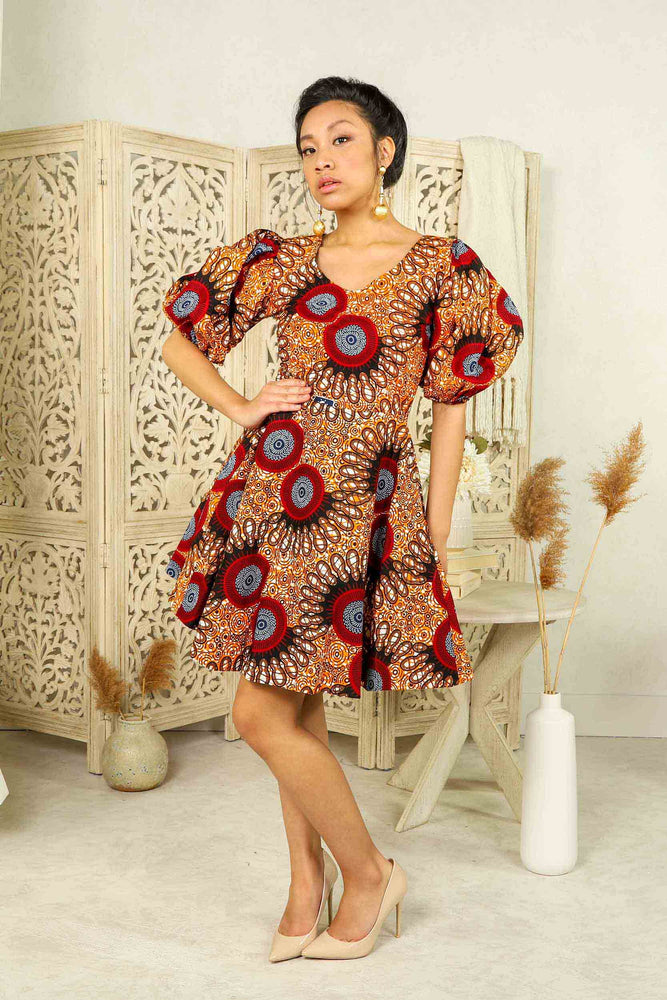 african print mini dress with puff sleeves and side pockets.