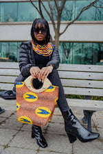 african bag with matching necklace